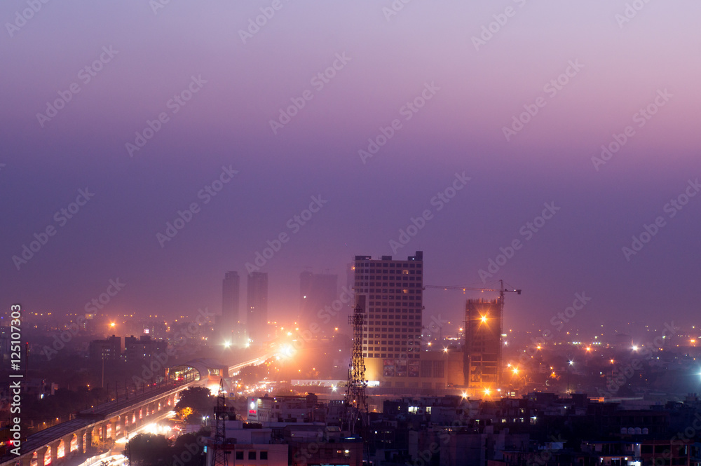 Buildings at dusk in Noida India Buildings at dusk in Noida India