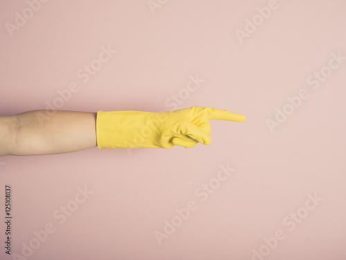 Hand in rubber glove pointing