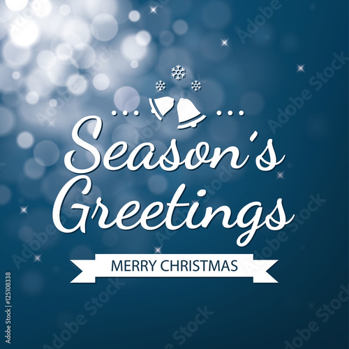 Season greetings with blue bokeh defocused background