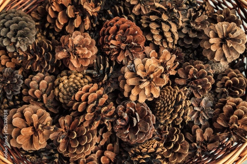 A basket full of dried pine cones background