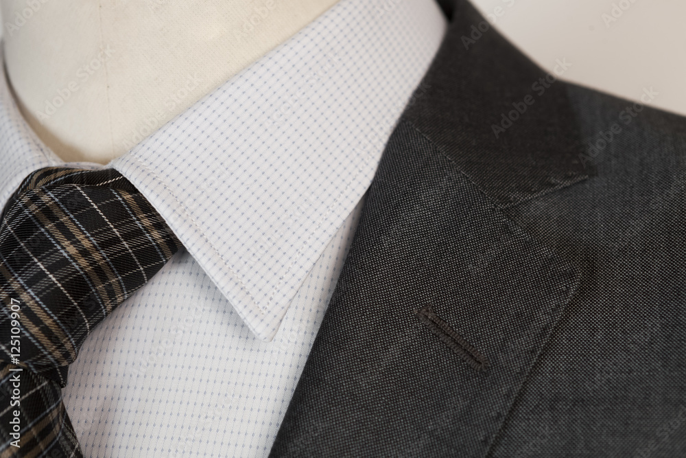 taylored menswear jacket. Detail with collar. grey fabric taylored menswear jacket. Detail with collar. grey fabric