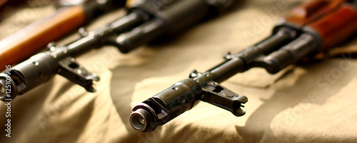 AK47 Rifle on a White on military background