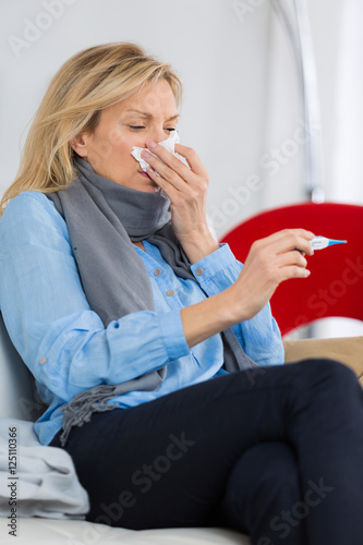 sick woman sneeze photo