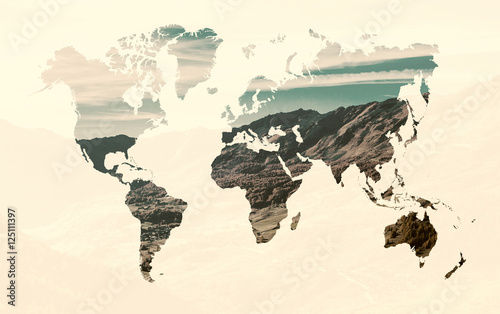 Double exposure of world map and autumn mountainscape