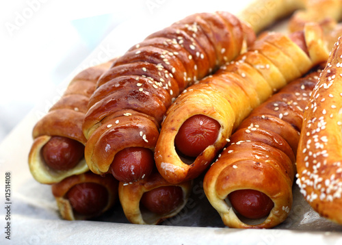 Hot Dog in puff pastry sausage rolls on baking sheet