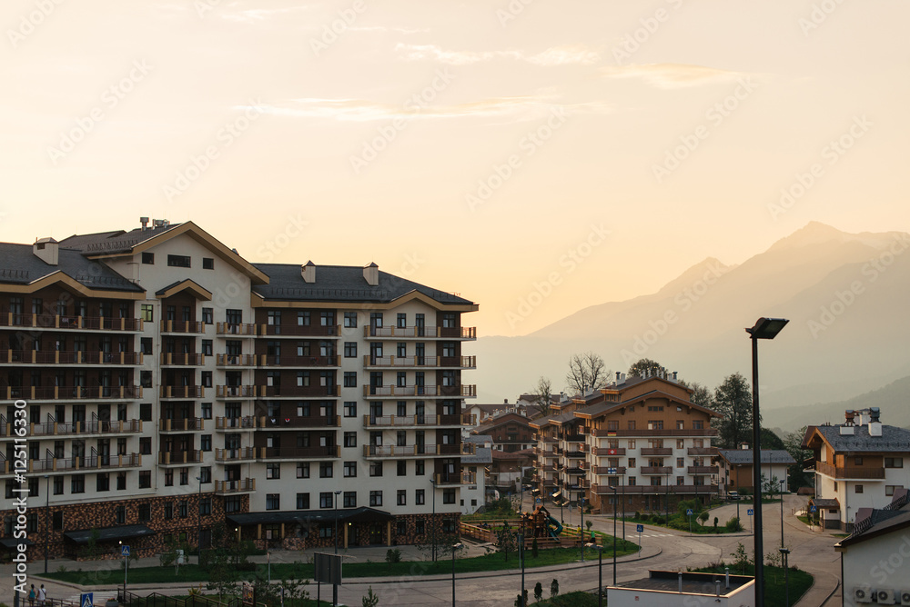 Hotels in the mountains at sunset