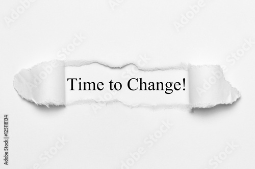 Time to Change! on white torn paper photo