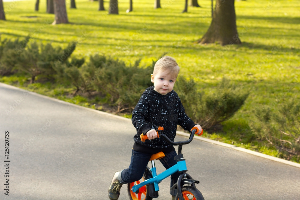 Little boy on the run bike