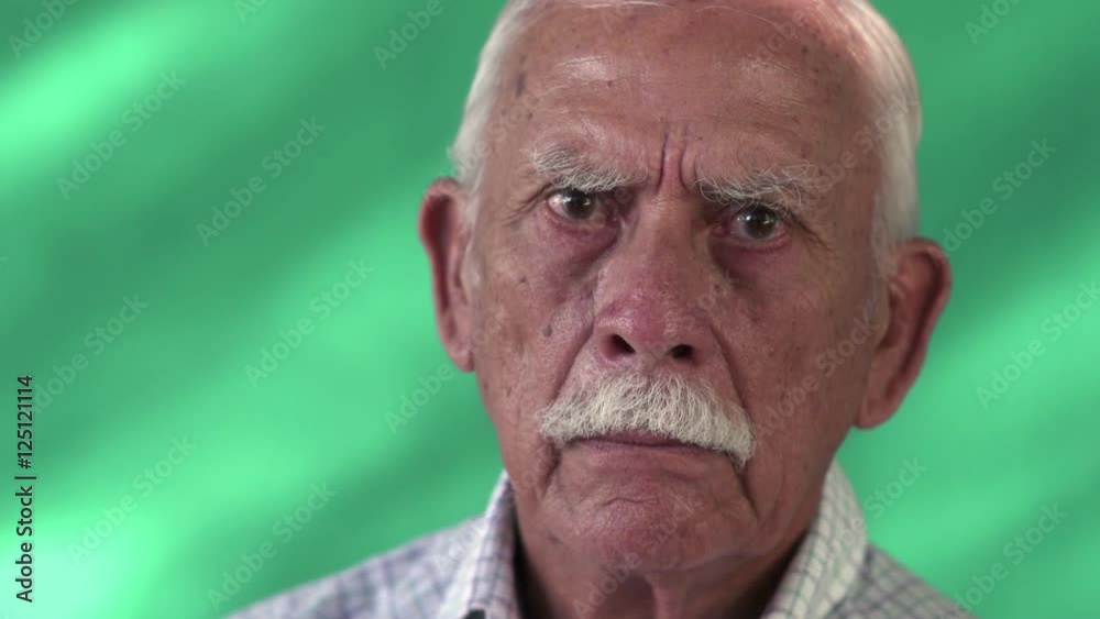 Old Cuban people and emotions, portrait of sad senior hispanic man looking at camera. Worried elderly latino grandfather from Havana, Cuba. Close up of face Old Cuban people and emotions, portrait of sad senior hispanic man looking at camera. Worried elderly latino grandfather from Havana, Cuba. Close up of face