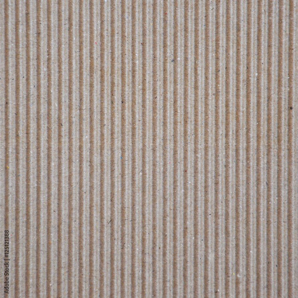Brown corrugated cardboard useful as a background Brown corrugated cardboard useful as a background