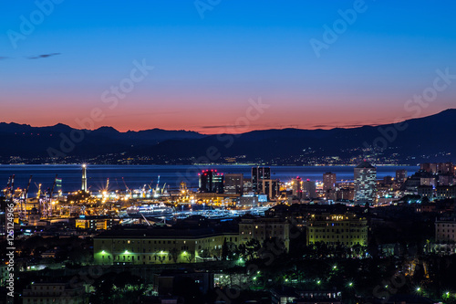 GENOA, ITALY, DECEMBER 29, 2014 - Night view of Genoa city center, buildings, skyscrapers and sea in Genoa, December 29, 2014, Italy Europe