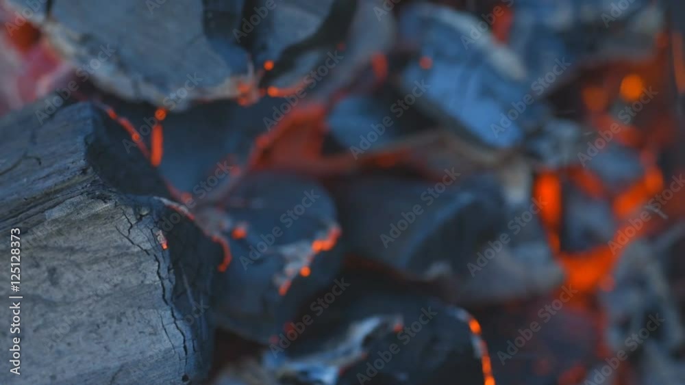 Coal burning in a brazier grill. Coal burning in a brazier grill.