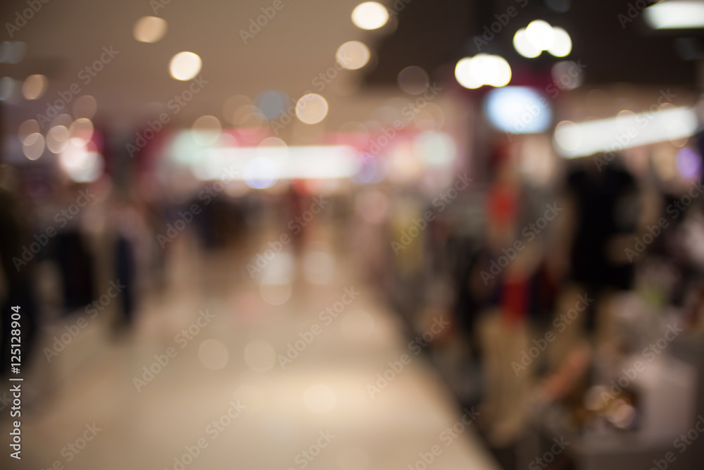 Blurred image of shopping mall background with bokeh.