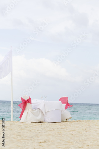 Fototapeta Naklejka Na Ścianę i Meble -  Romantic Table for Two on the Beach