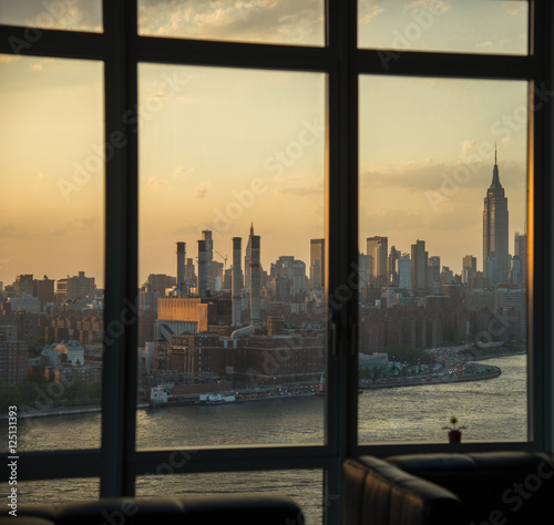 Photography View over the East River looking at Manhattan and the Empire State Building