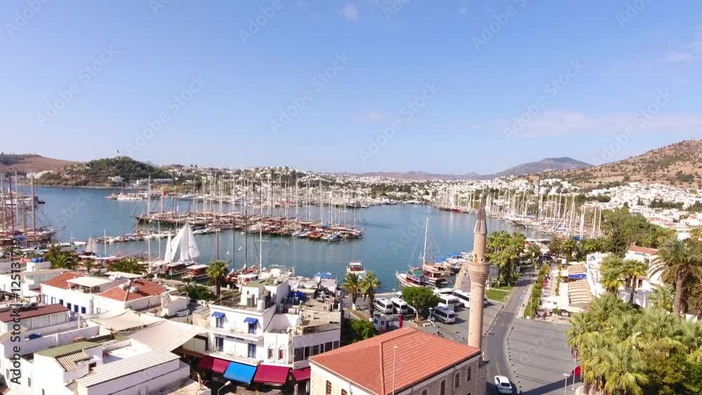 Bodrum city center, white houses, marina, mosque and minaret drone shot Mugla TURKEY Bodrum city center, white houses, marina, mosque and minaret drone shot Mugla TURKEY