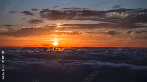 Sunrise over sea of clouds
