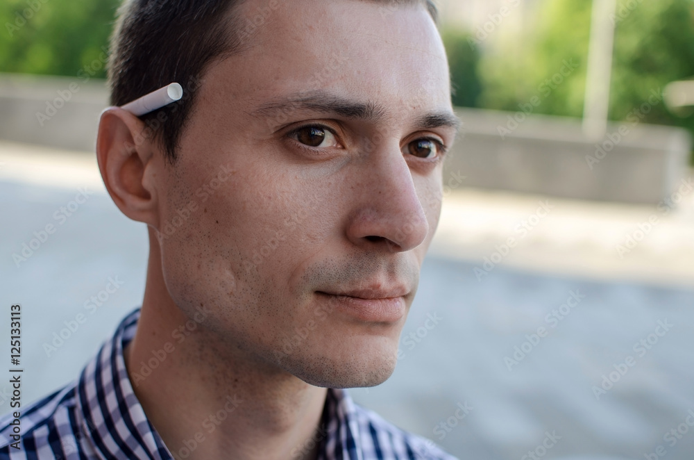 Young man smoking cigarette Young man smoking cigarette