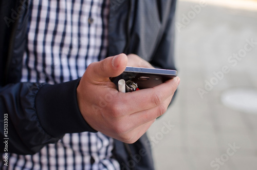 Young man using his phone