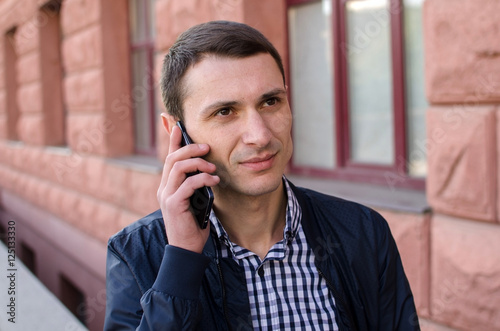 Young man using his phone