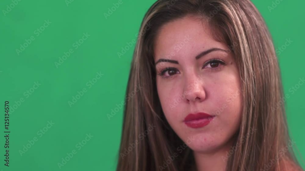 Portrait of sad people with emotions and feelings. Sadness, depression, anxiety. Worried hispanic young woman looking at camera with depressed expression on face. Close up, copy space Portrait of sad people with emotions and feelings. Sadness, depression, anxiety. Worried hispanic young woman looking at camera with depressed expression on face. Close up, copy space