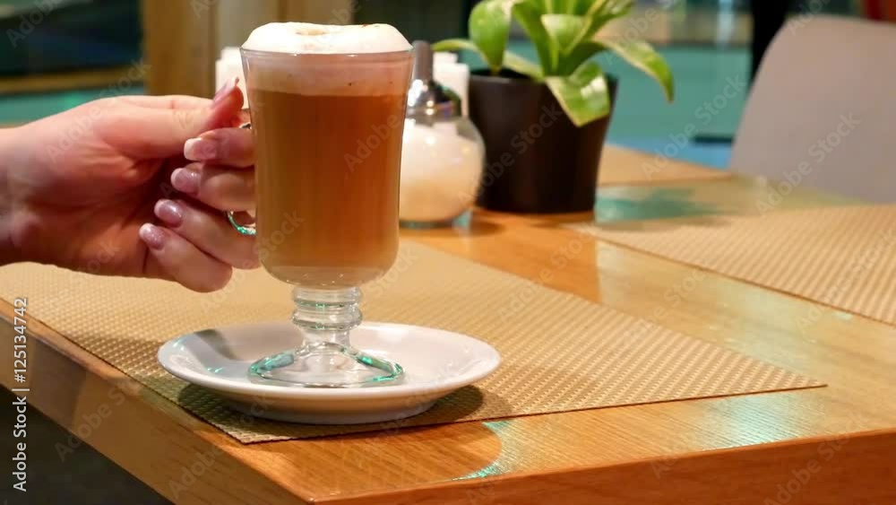 4K Woman drinking coffe latte.