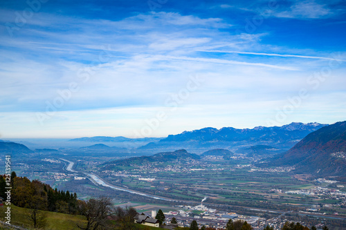 A town in the valley surrounded by mountains © liamalexcolman