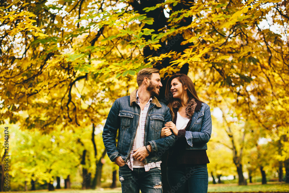 Loving couple in the autumn park Loving couple in the autumn park