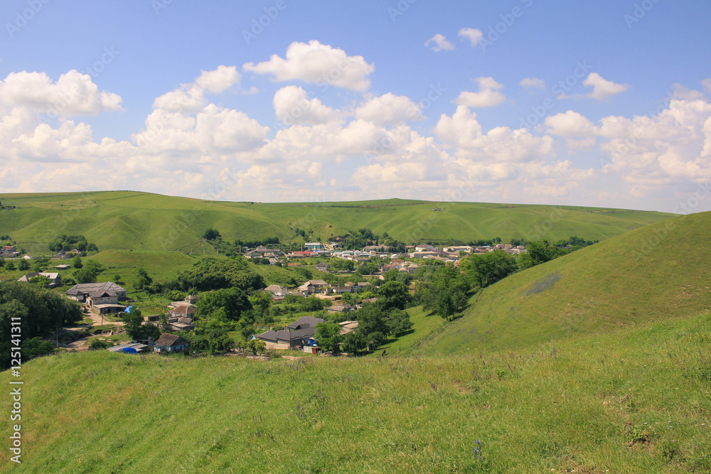 Picturesque village on the hill landscape 