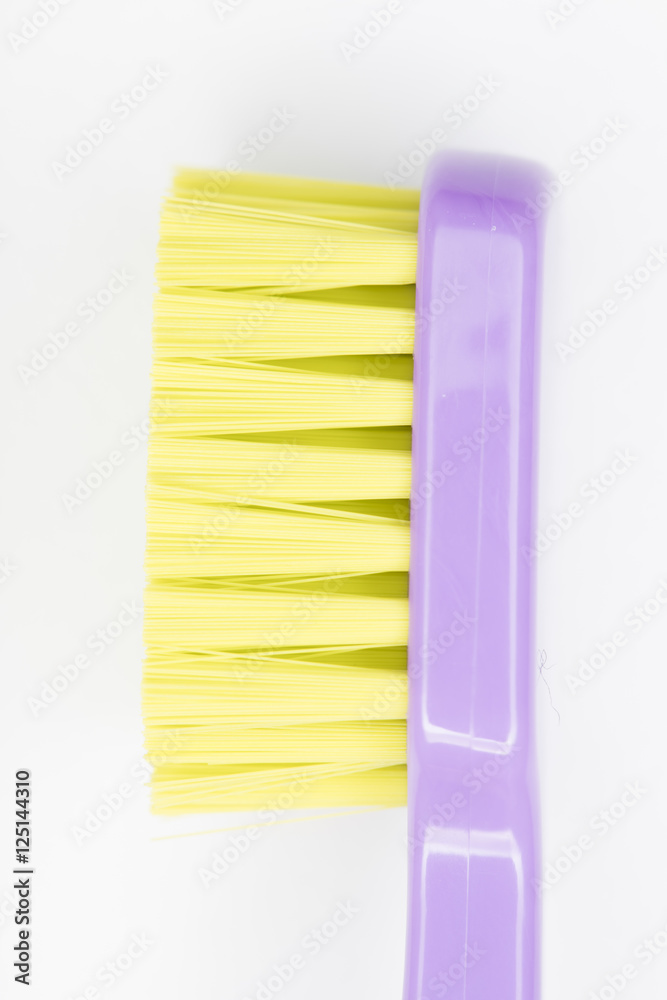 colorful toothbrush isolated on white background, upright postio colorful toothbrush isolated on white background, upright postio