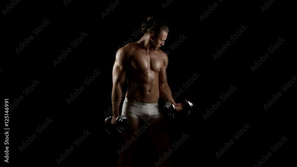 Bodybuilder with dumbbells