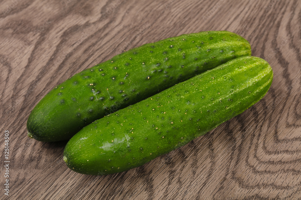 Two green cucumbers