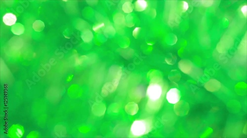 Green bokeh Christmas background. Defocused lights. 