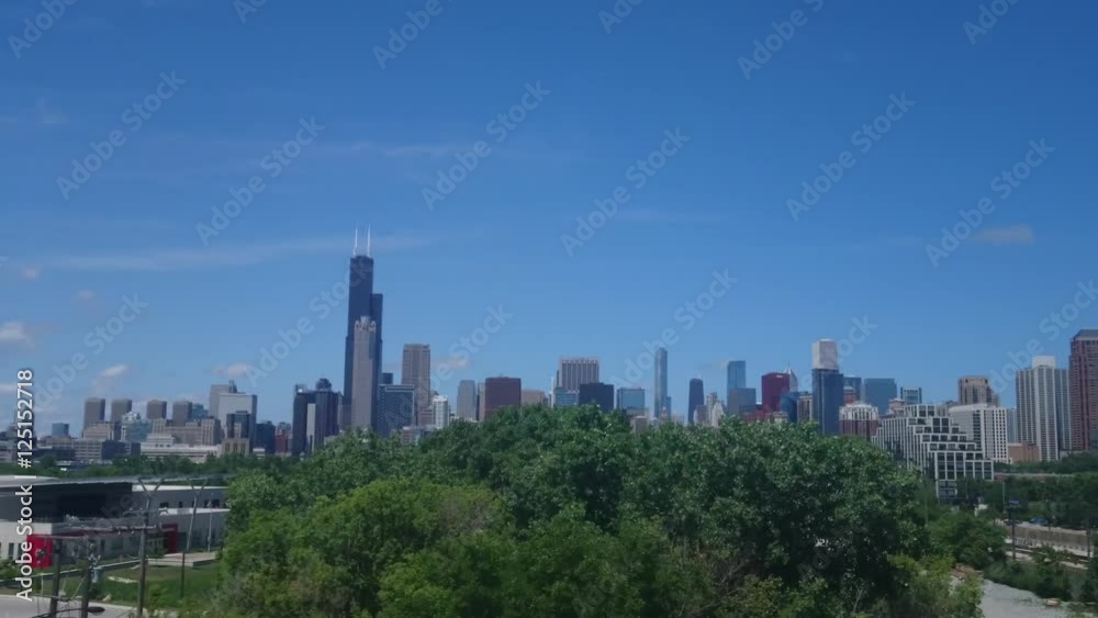 Chicago, Illinois - July, 2016 - Downtown Chicago and Willis Tower view from the train. Chicago, Illinois - July, 2016 - Downtown Chicago and Willis Tower view from the train.