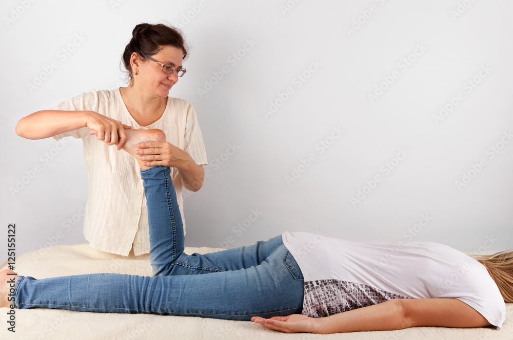 Bowen therapy of a young woman. Bowen therapy of a young woman.