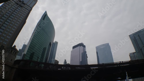 Chicago, Illinois - July, 2016 - Looking up at the high rise buildings in downtown from a boat in Chicago River.