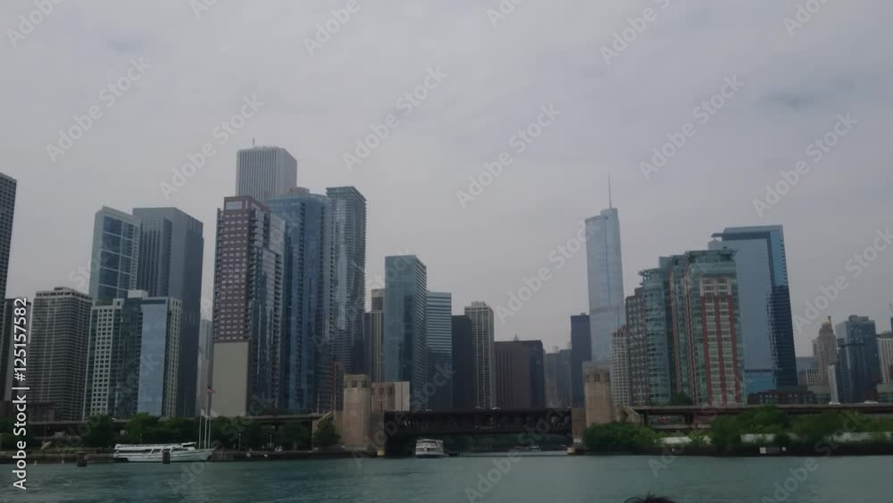 Chicago, Illinois - July, 2016 - Looking back at the skyline from the lakefront where the Chicago River meets Lake Michigan. Chicago, Illinois - July, 2016 - Looking back at the skyline from the lakefront where the Chicago River meets Lake Michigan.