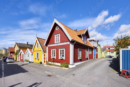 Fototapeta Naklejka Na Ścianę i Meble -  Row of ancient colorful wooden houses in the city of Karlskrona, Sweden