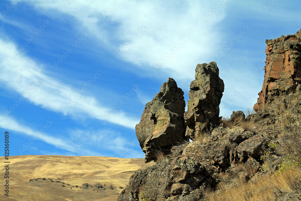 Giant Rocks on a Hillside Overlooking a Valley