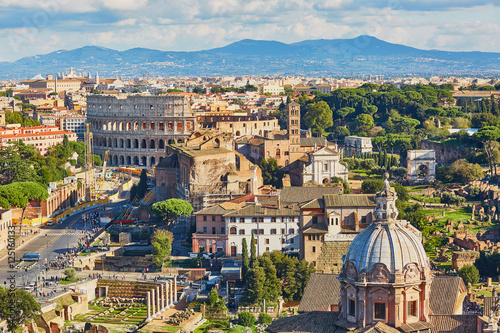 Photography Aerial scenic view of Colosseum and Roman Forum in Rome, Italy