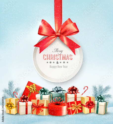 Christmas presents with a gift card and a ribbon. Vector.