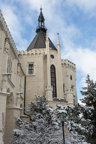 beautiful grand castle covered in snow in winter in Czech Republ photo