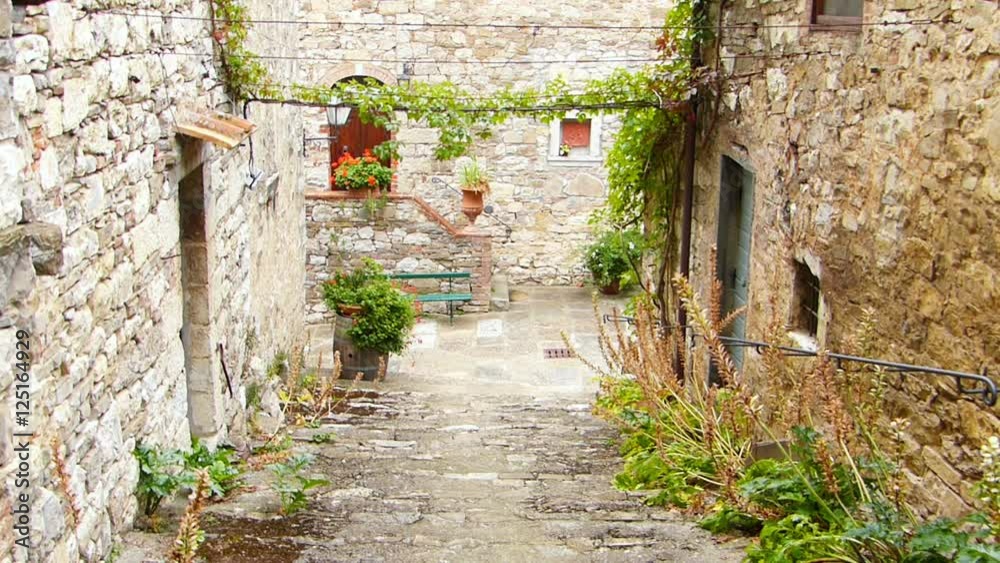 Old stairs between two Mediterranean houses in Italy Old stairs between two Mediterranean houses in Italy