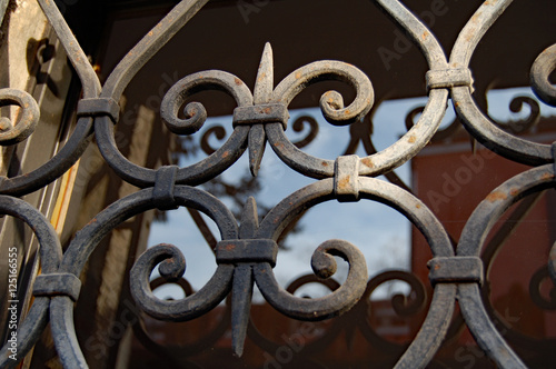 iron work on window frame close with sunlight photo