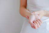 soft focus on hand of woman feel pain that are sign of Rheumatoi
