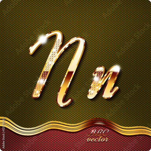 This stylish gold cursive letters. There are inlaid with a capital "N" and the lowercase letter "n". They have shadows and highlights.