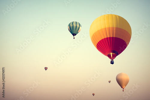 Tablou canvas Hot air balloon on sky with fog, vintage and retro instagram filter effect style