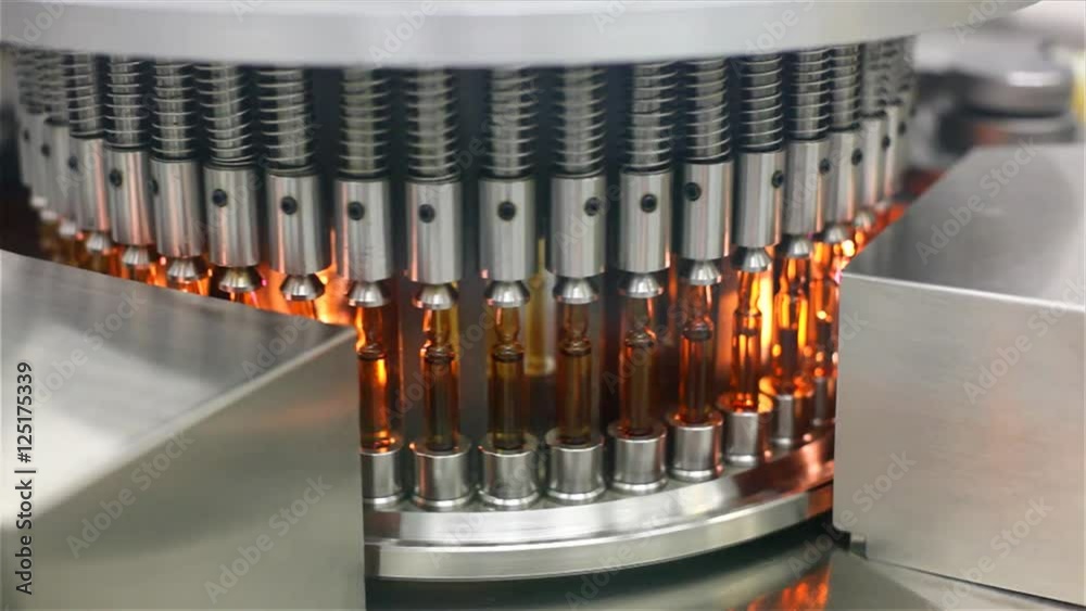 Automatic optical inspection machine, inspects vials and ampoules for