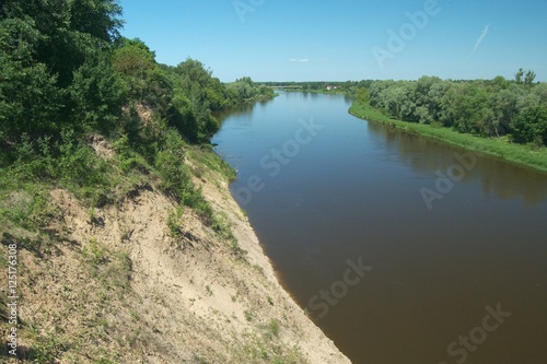 Bug River. Poland wschodnia.Dolina river with trees growing on the shore.