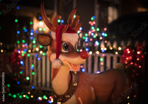 Rudolph the raindeer with bokeh of Christmas lights photo